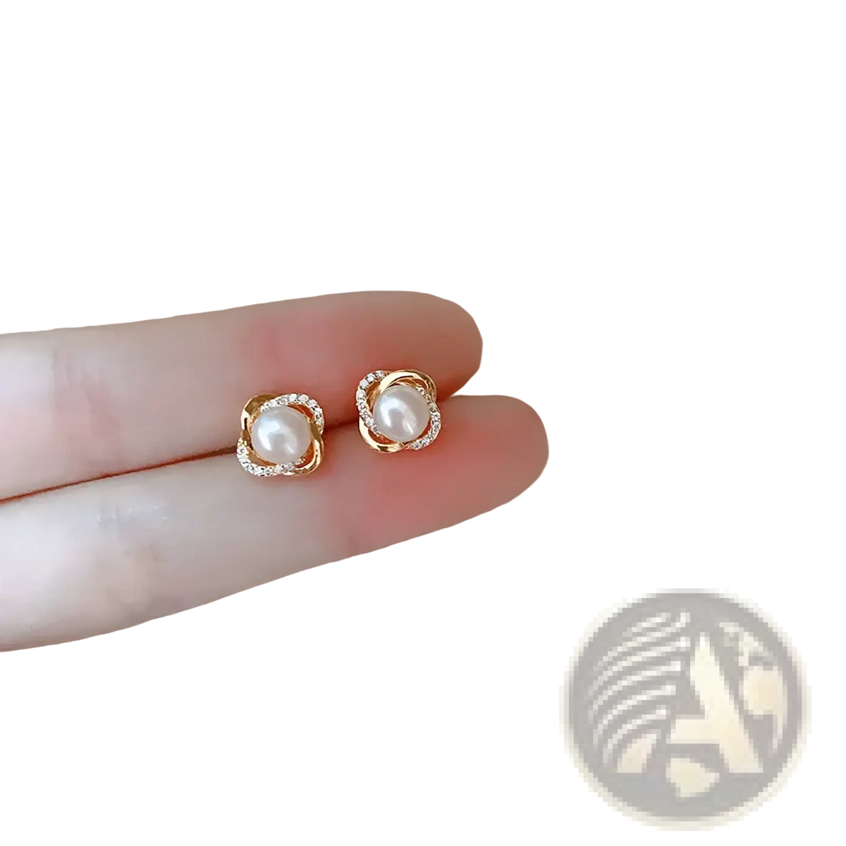 Gold-toned pearl twist stud earrings featuring a central pearl surrounded by twisted metal and small sparkling stones