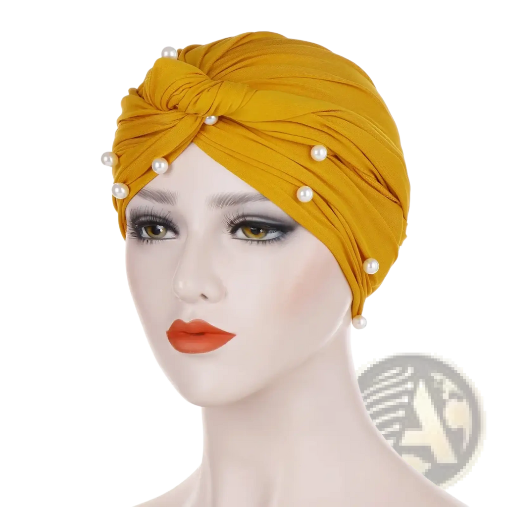 Golden velvet turban hijab for women adorned with white pearls showcasing elegant traditional design