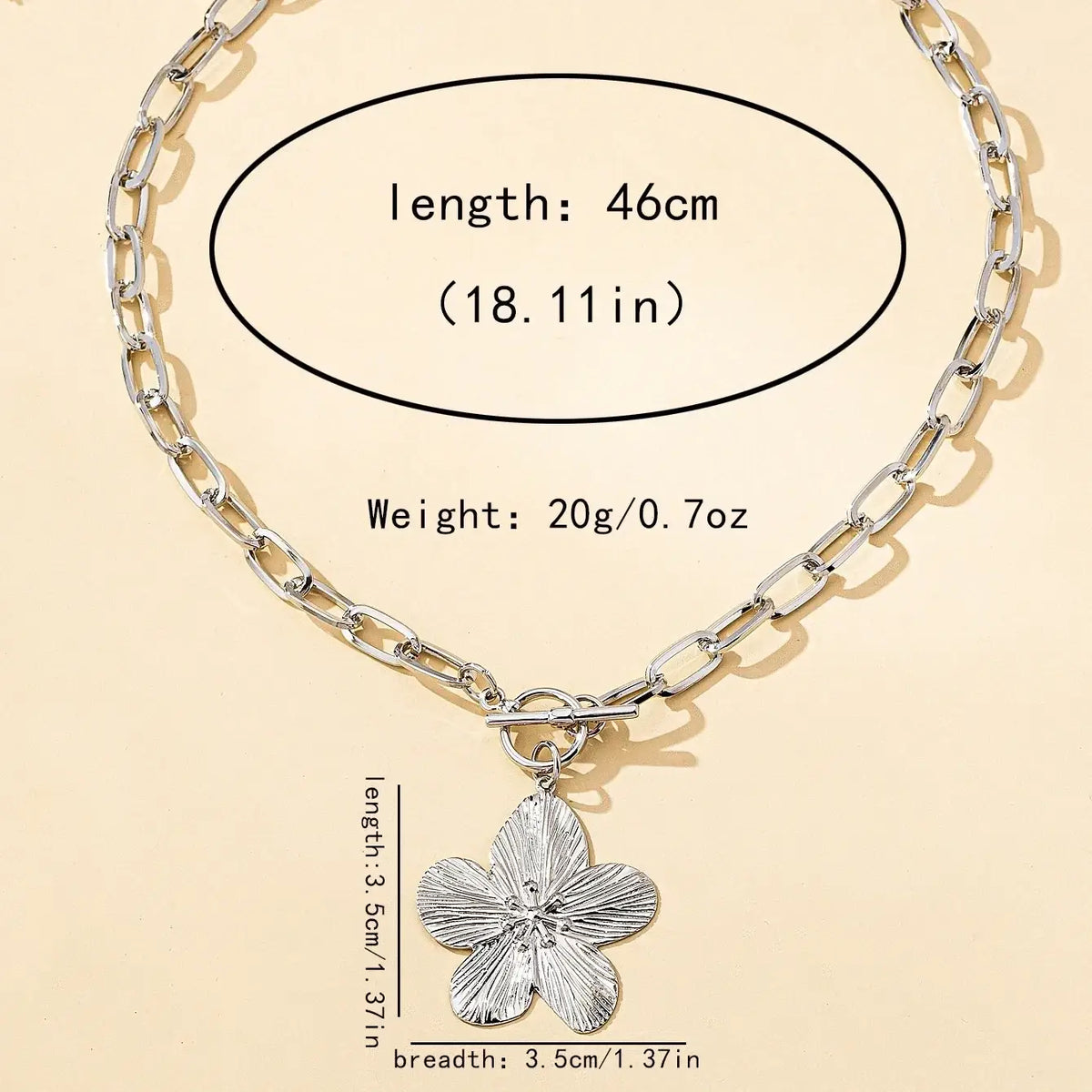 Silver chain pendant necklace featuring a detailed textured wisteria flower vintage design for women