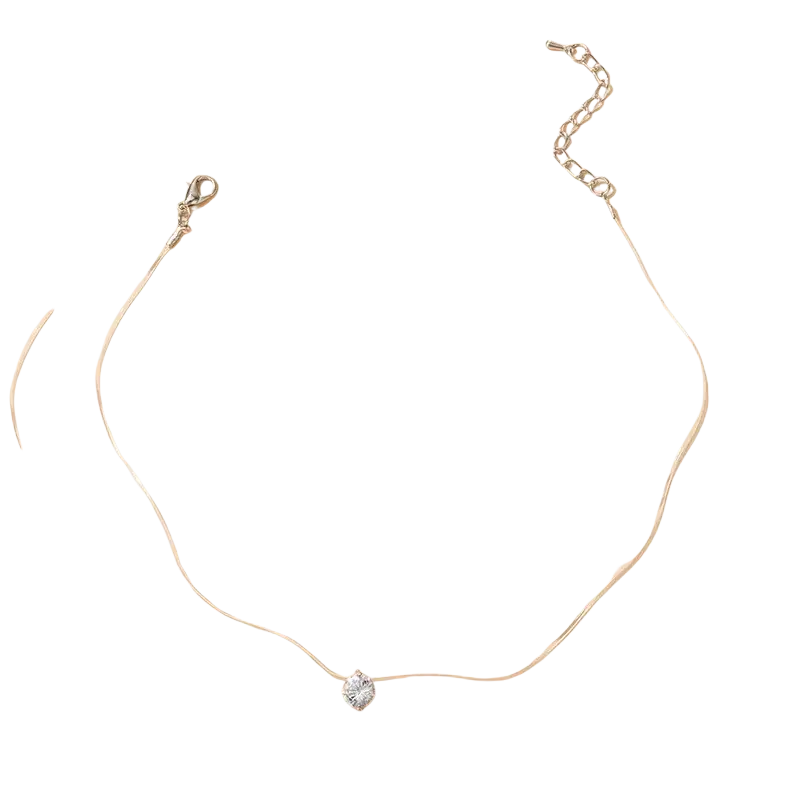 Delicate silver pendant necklace featuring a simple round single clear crystal rhinestone choker design