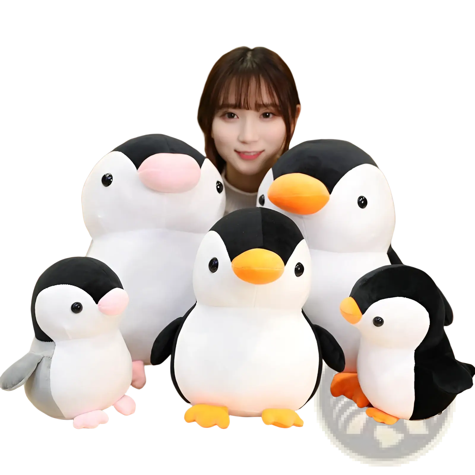 A collection of soft stuffed penguin plush toys in black white and gray with orange beaks and feet for kids and teens