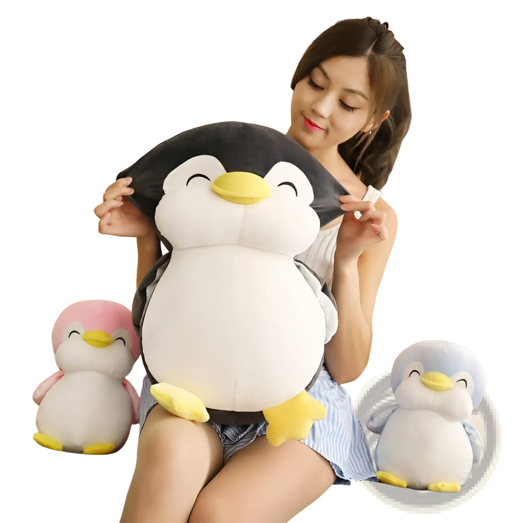 A plush black and white penguin stuffed animal with yellow beak and feet designed as a soft toy for kids