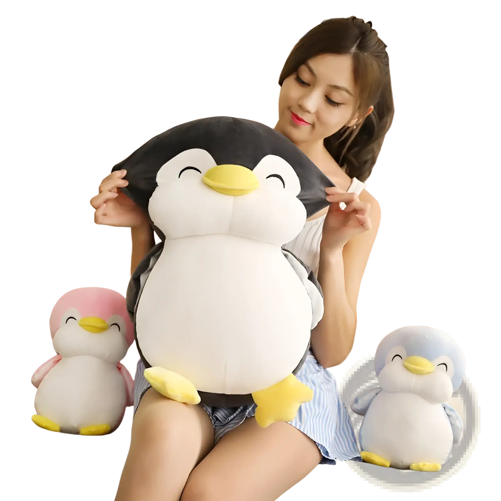 A plush black and white penguin stuffed animal with yellow beak and feet designed as a soft toy for kids
