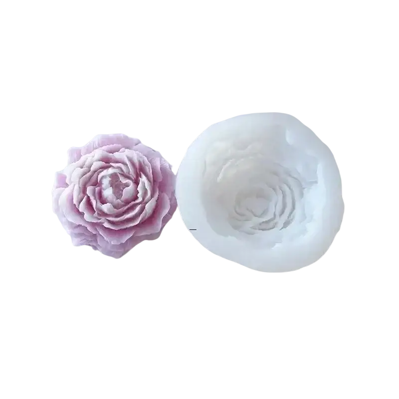 A delicate pink silicone peony candle mold with intricate petal details for diy floral soap and resin crafting