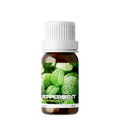A small amber glass bottle of embracex peppermint essential oil 10ml for skin and hair care with white cap and green leaves label