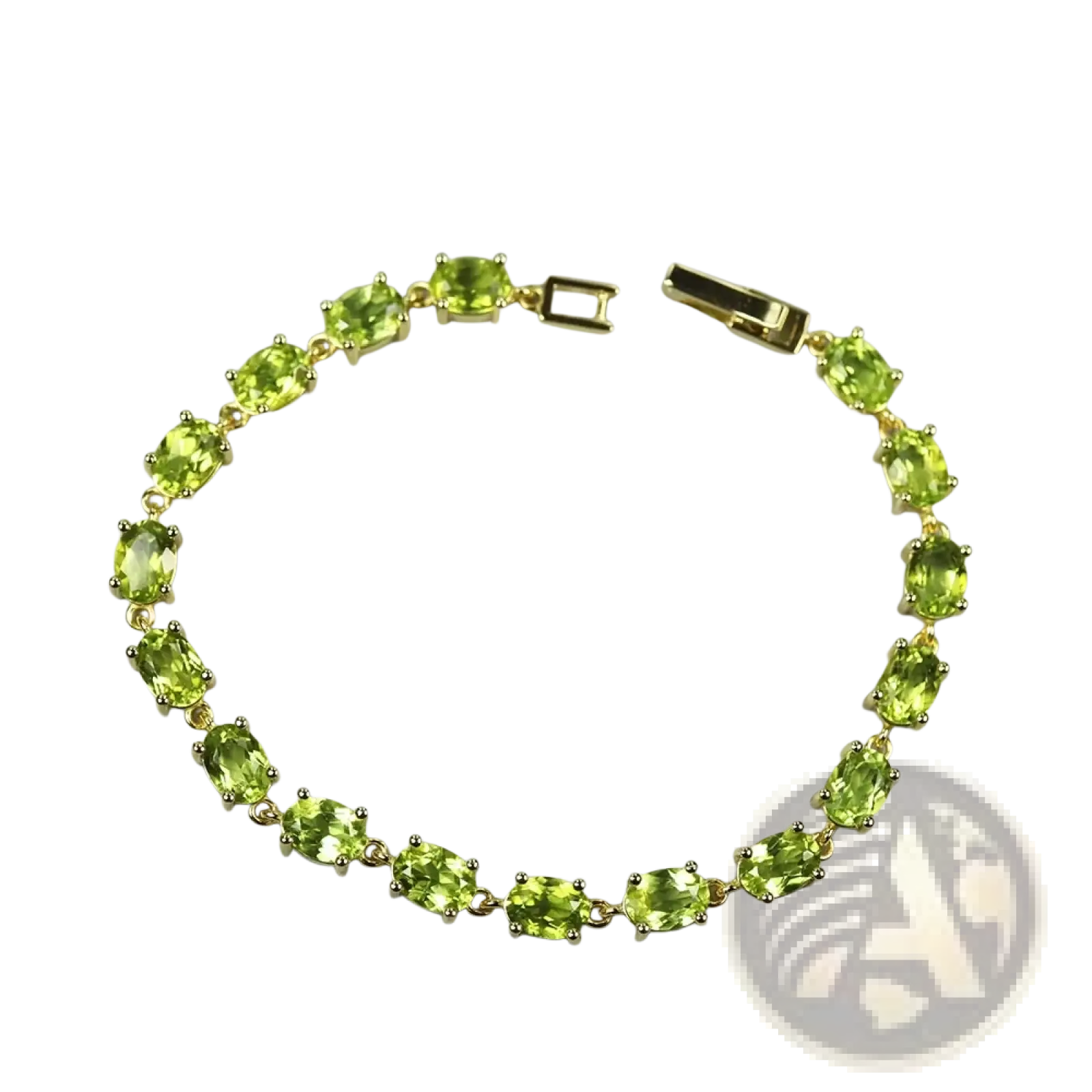 A delicate gold toned peridot sterling silver tennis bracelet with oval cut stones in a classic link design