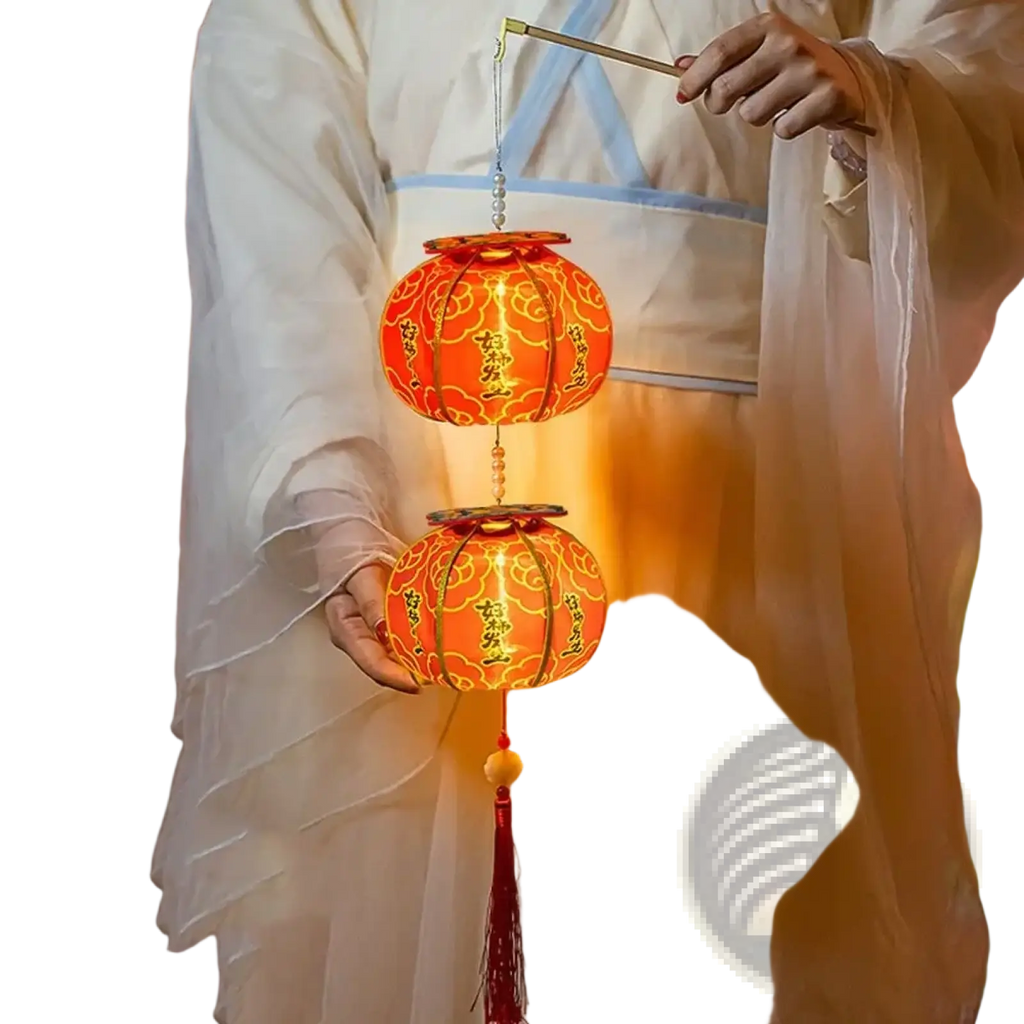 A persimmon lantern Chinese New Year led decor glowing orange with gold patterns and red tassel held by white robes