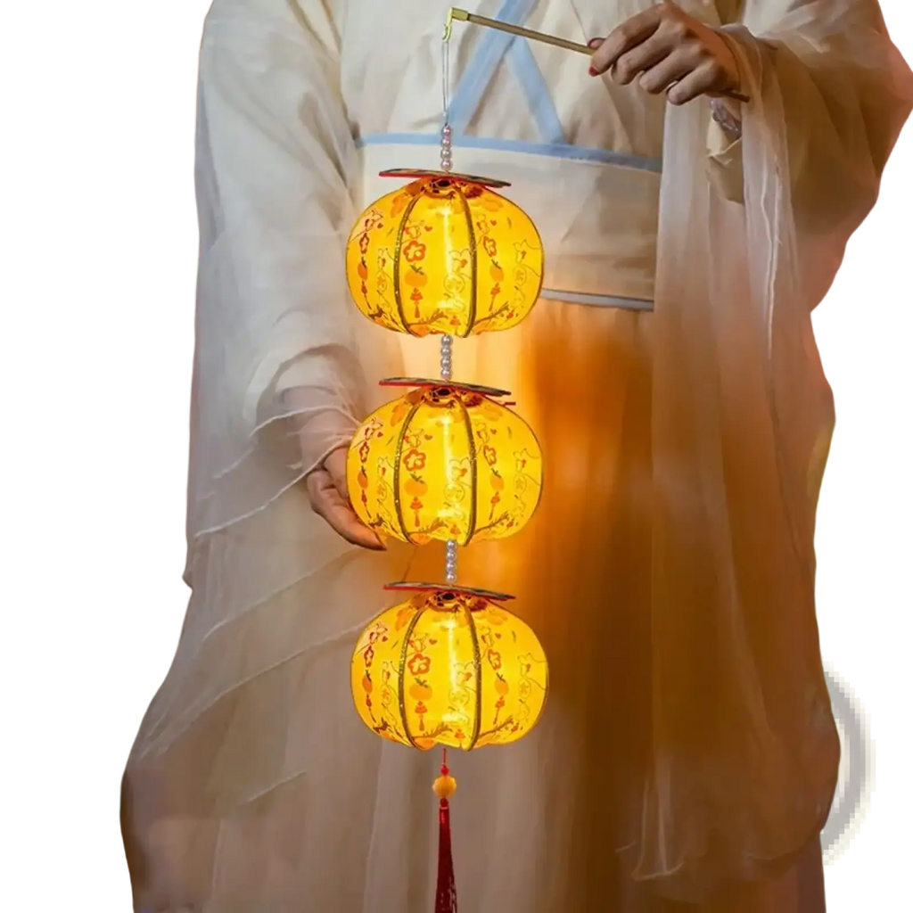 Three glowing orange persimmon lanterns with intricate floral patterns suspended in a vertical chain for chinese new year decor
