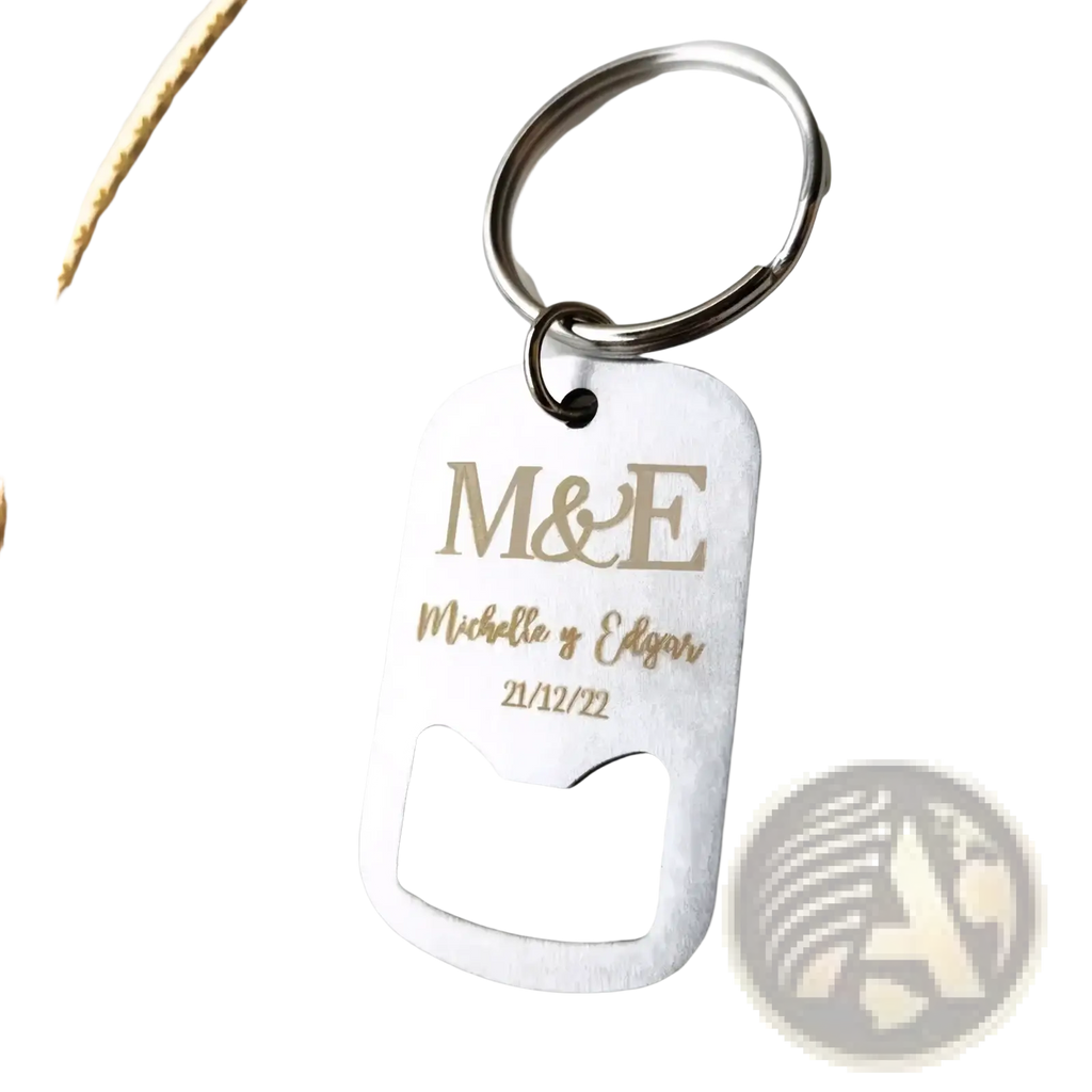 A sleek silver dog tag-shaped personalized bottle opener keychain with engraved gold lettering for wedding favors