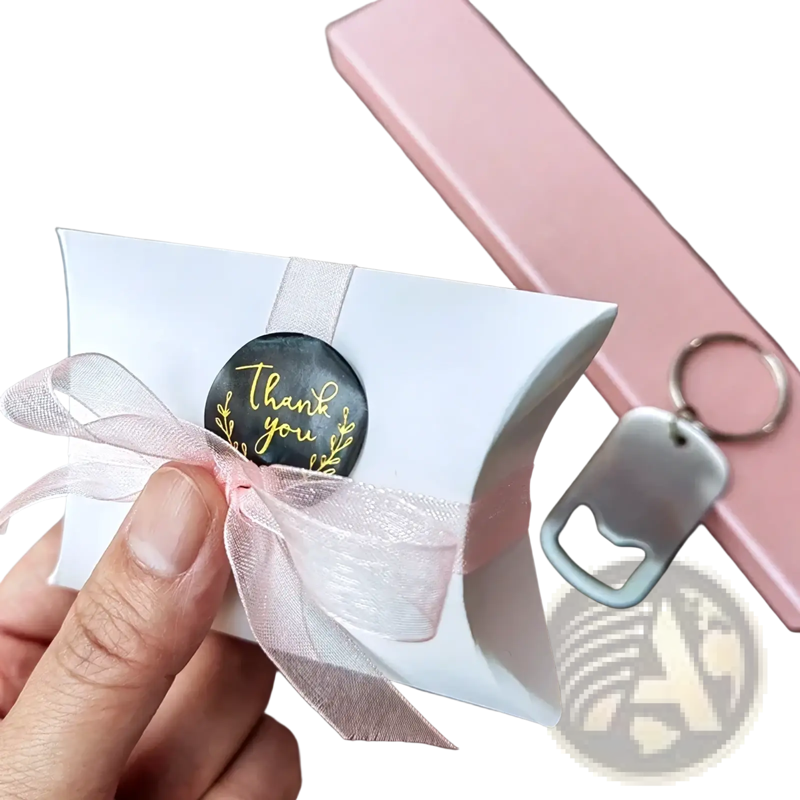 White paper gift box with pink sheer ribbon and gold thank you sticker for personalized wedding bottle opener keychains