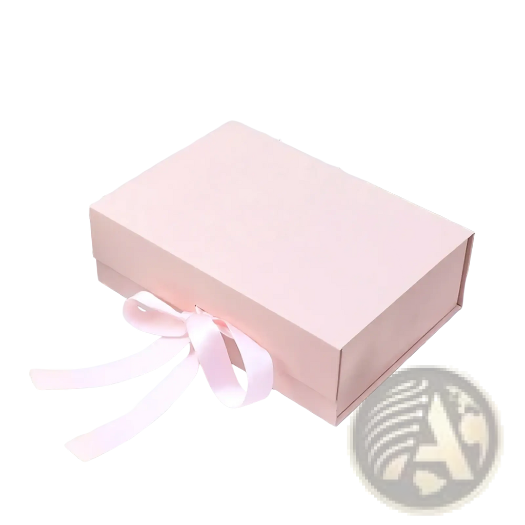 A soft pink personalized bridesmaid proposal gift box with a matching satin ribbon tied into a bow on its side