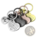 Set of heart-shaped stainless steel personalized calendar keychains with engraved dates and i love you in multiple finishes