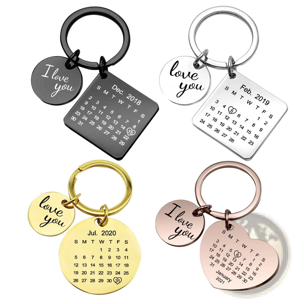 Set of four personalized calendar keychains in black silver gold and rose gold with i love you charms for anniversaries