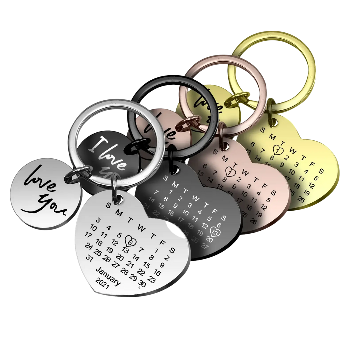 Set of heart-shaped stainless steel personalized calendar keychains with engraved dates and i love you in multiple finishes