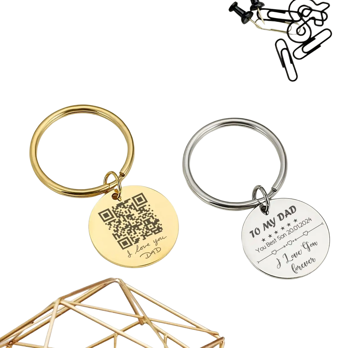 Two personalized fingerprint QR code keychain gifts with gold and silver circular metal charms featuring engravings