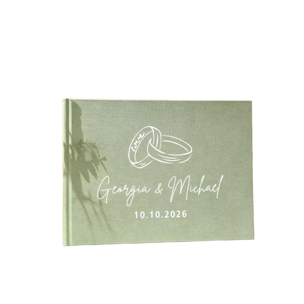 Personalized green linen wedding guest book with mint green textured cover and engraved interlocking rings and names