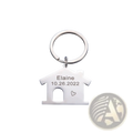 Silver house-shaped keychain made of metal with engraved name and date personalized as a custom couple gift