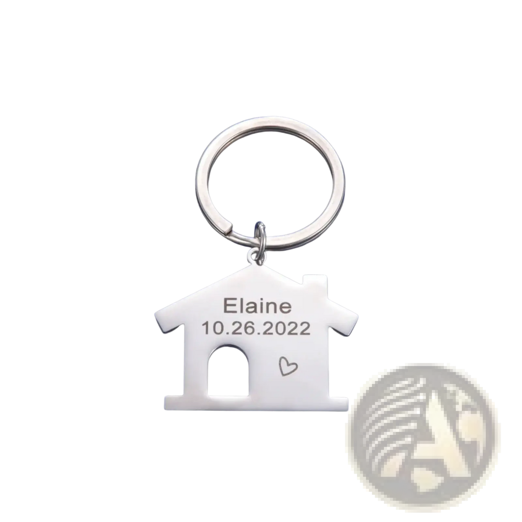 Silver house-shaped keychain made of metal with engraved name and date personalized for couple gift