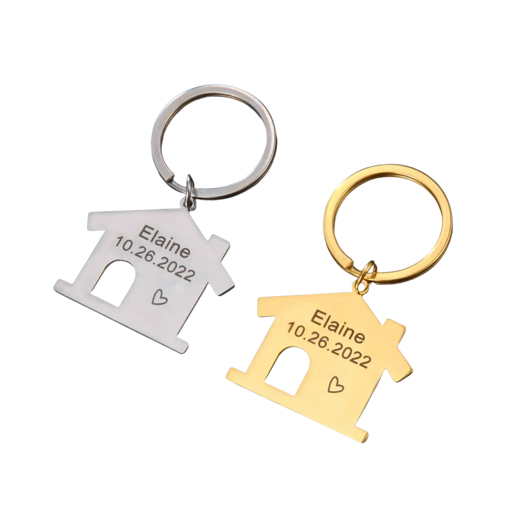 Personalized house keychain couple gift with silver and gold engraved keychains featuring name elaine date 10.26.2022 and heart symbol
