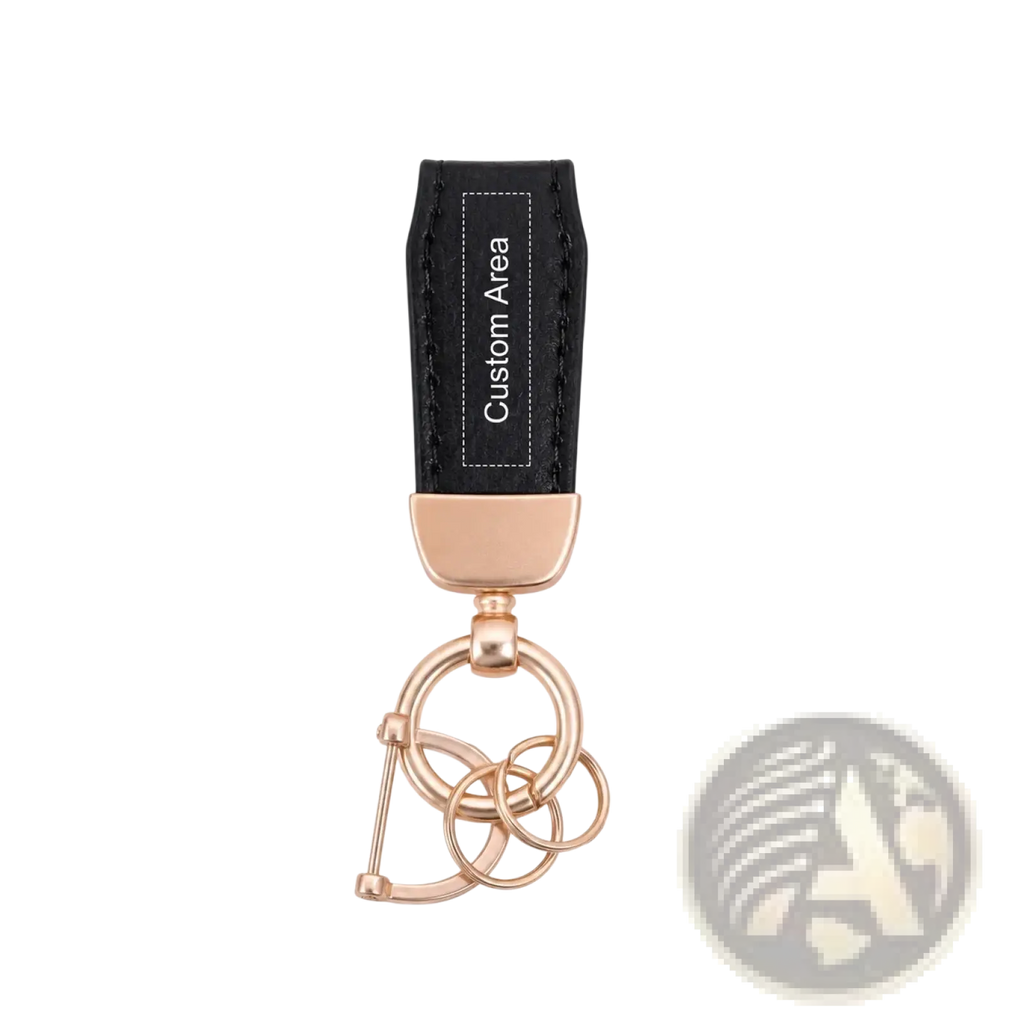 Personalized leather keychain in black with rose gold metal rings and custom engraving area for key holder