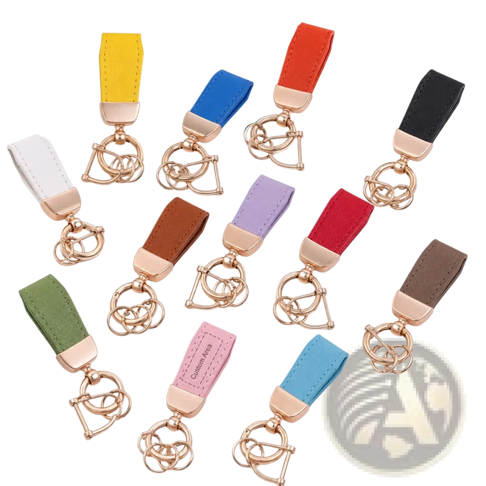A collection of colorful personalized leather keychains with rose gold metal hardware and interlocking ring design