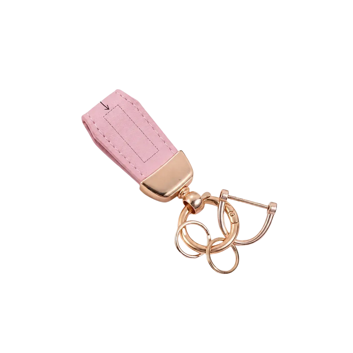 Personalized pink leather keychain with rose gold metal accents and decorative ring cluster for custom engraved keys