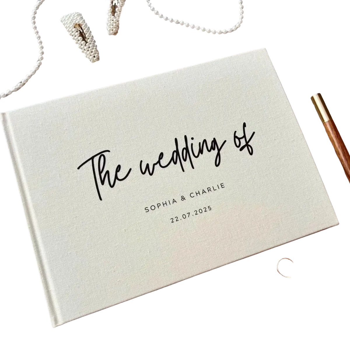 Personalized beige linen wedding guest book polaroid album with black cursive script and custom names and date