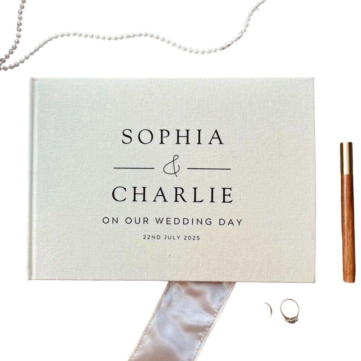 Personalized cream-colored linen wedding guest book polaroid album with black engraved text for sophia and charlie 2025