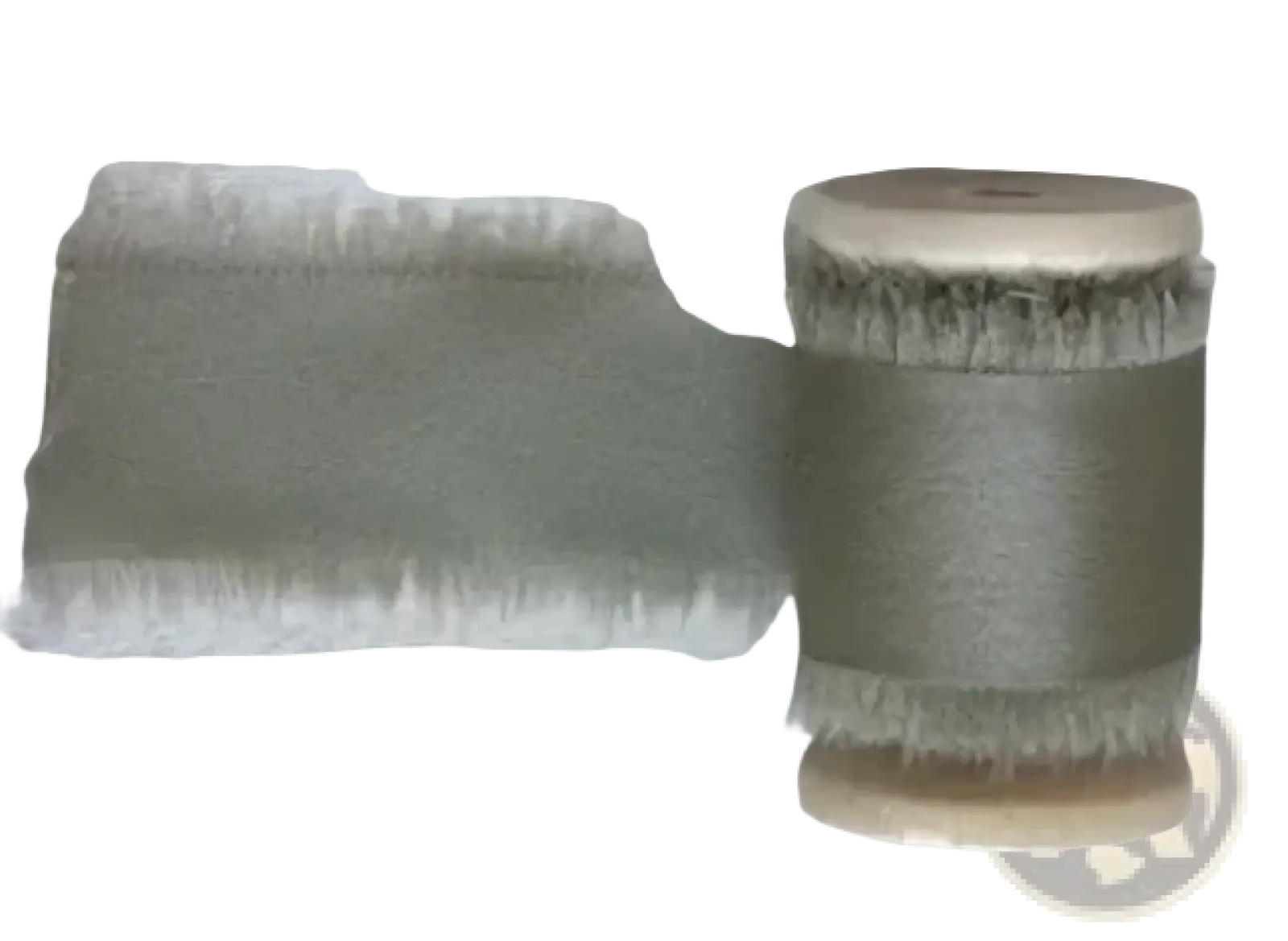 Sage-colored frayed-edge ribbon wound on a spool for personalized minimalist wedding letter books set packaging