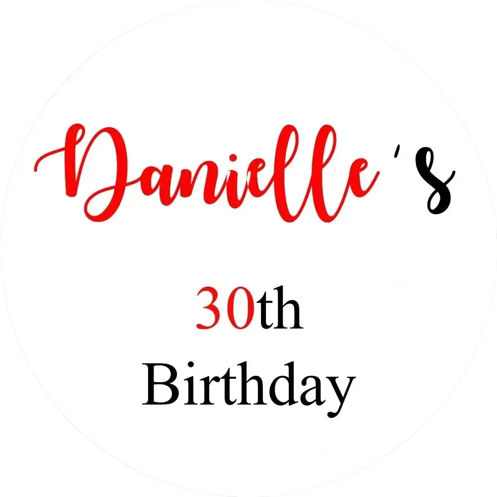 A personalized round baby shower welcome sign kt board featuring a white circular sticker with red and black text