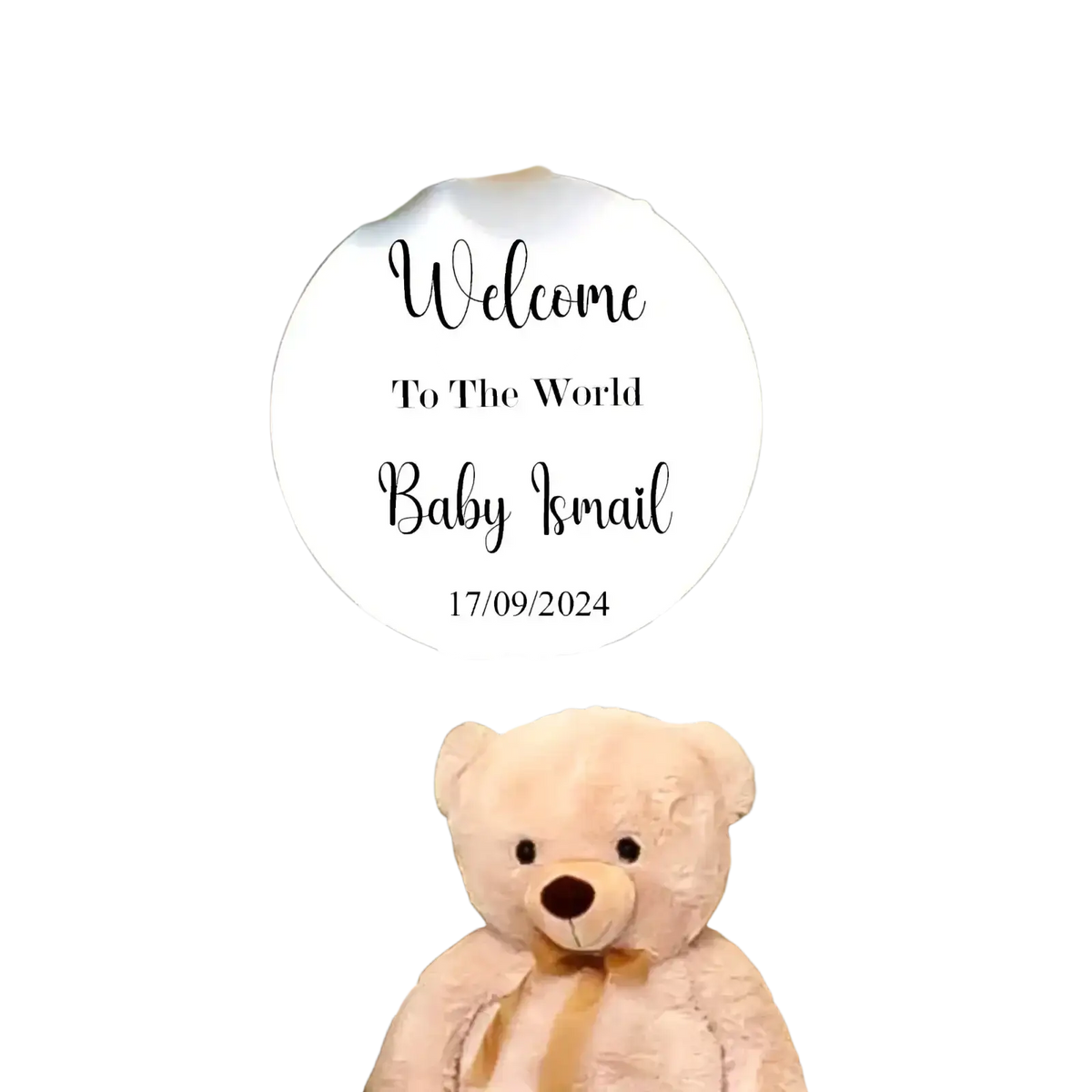Cream-colored plush teddy bear with soft textured fur featured on personalized round baby shower sign kt board