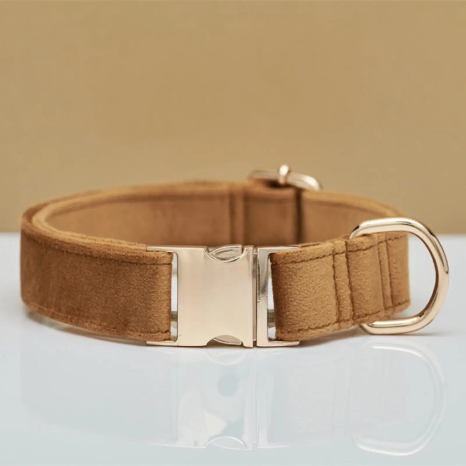 Tan suede personalized velvet dog collar with silver metal buckle and d-ring featuring a decorative bow detail