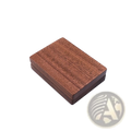 A personalized walnut wood wedding ring box with a rich warm brown finish and visible grain patterns