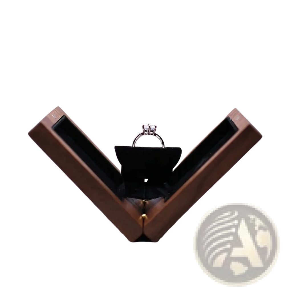 Personalized walnut wood wedding ring box in dark wood with black velvet interior holding a silver solitaire ring