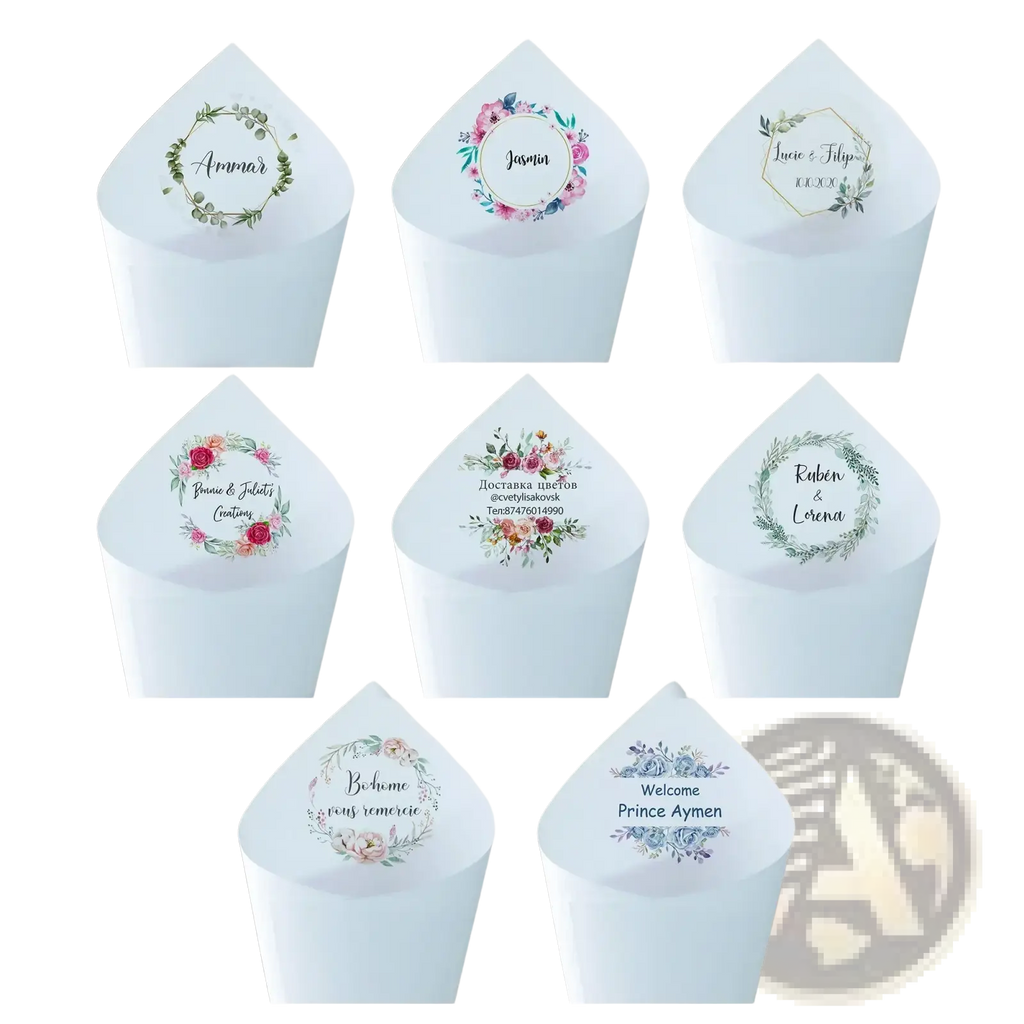 Personalized white paper wedding confetti cones with delicate floral wreaths and elegant script names 30pcs set