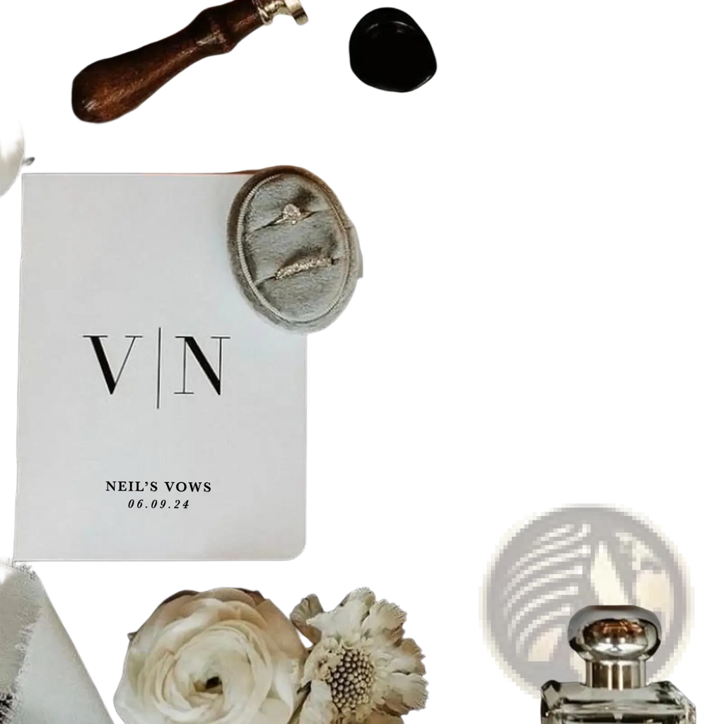 Personalized wedding vow books set featuring minimalist black and white vow cards with elegant serif monogram v|n
