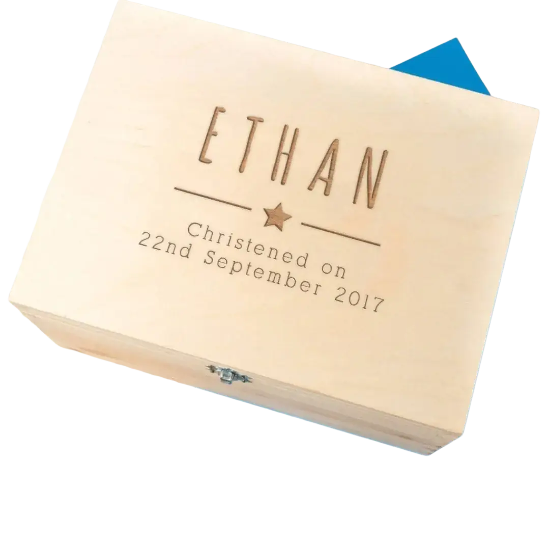 Personalized light wooden baptism keepsake box with engraved name ethan date and star detail on the lid