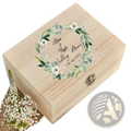 Personalized wooden floral wedding memory box in light natural wood with engraved names and delicate wreath design
