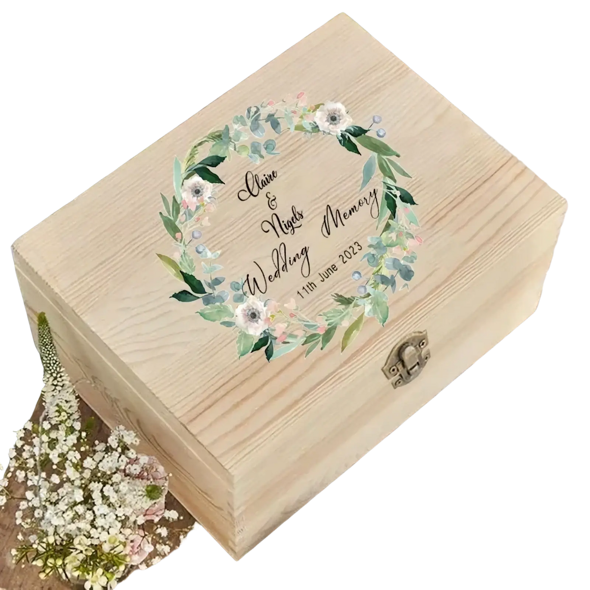 Personalized wooden floral wedding memory box in light natural wood with engraved names and delicate wreath design