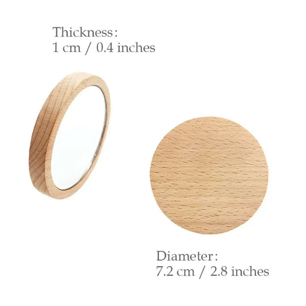 Personalized wooden pocket mirror with circular natural light wood frame and visible grain for wedding favors