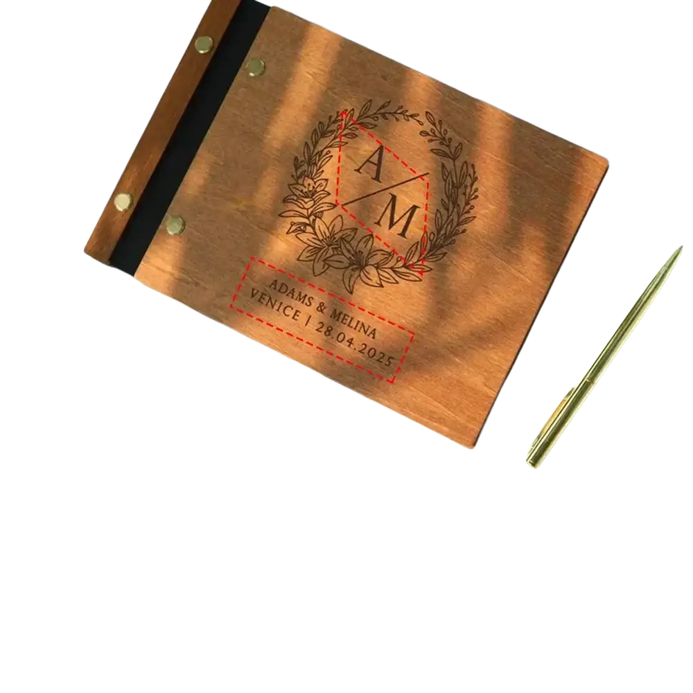 Personalized wooden wedding guest book with laser-engraved monogram and floral wreath design with brass rivets