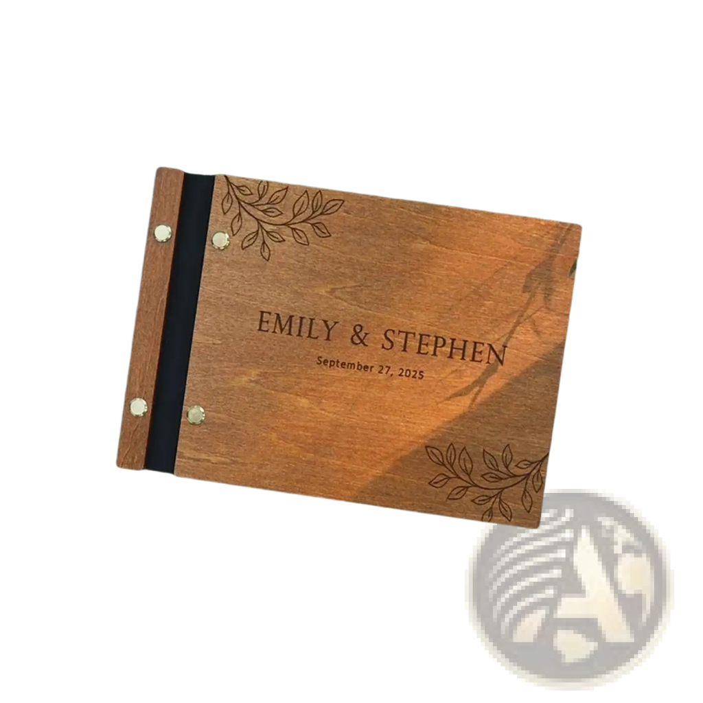 A warm-toned wooden personalized wedding guest book with engraved names leaf motifs black binding and brass rivets