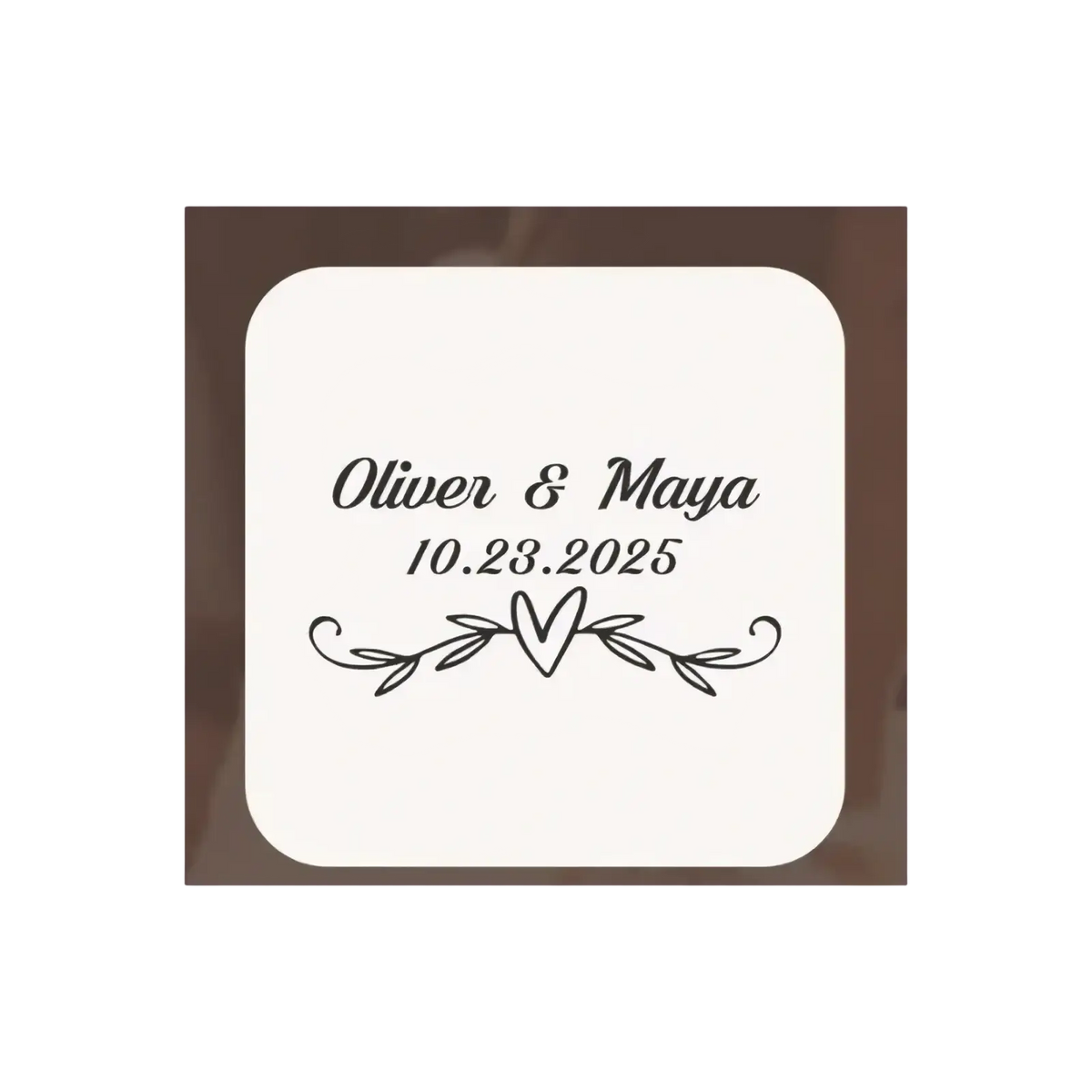 Personalized wooden wedding ring box with cream square coaster featuring black engraved text and leafy heart design