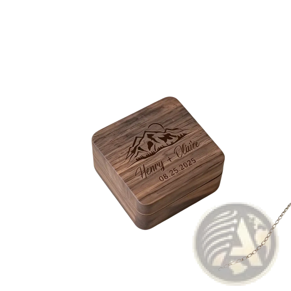 A square dark wood personalized wooden wedding ring box with engraved mountain design names and date