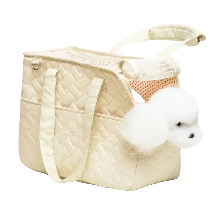 Cream-colored quilted pet bag with mesh side panel and soft white fluffy dog peeking out for small dogs breathable use