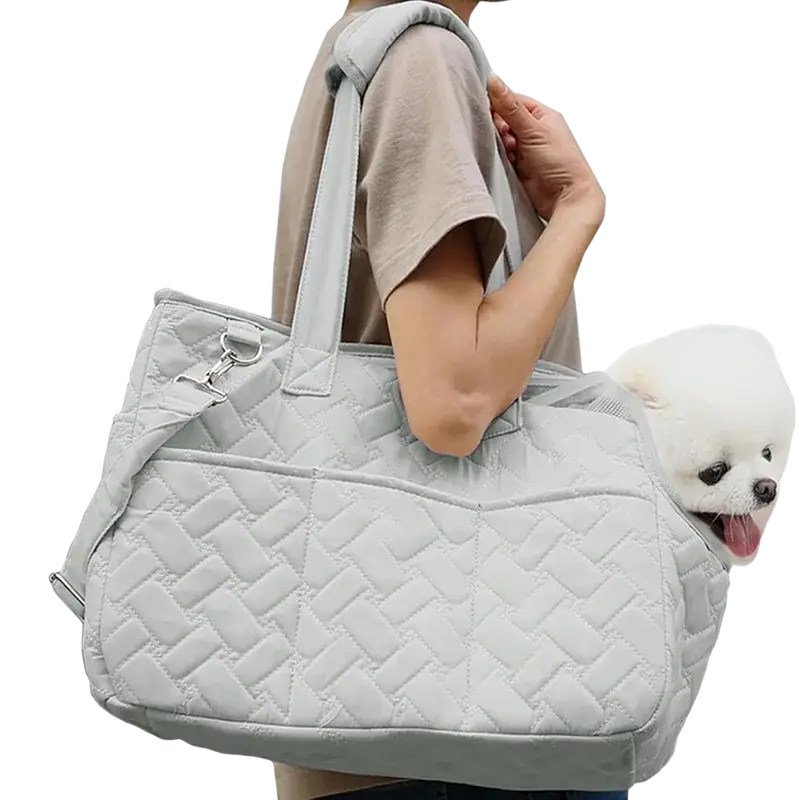 Light gray quilted pet bag with woven diamond pattern and adjustable shoulder strap for small dog carrier use