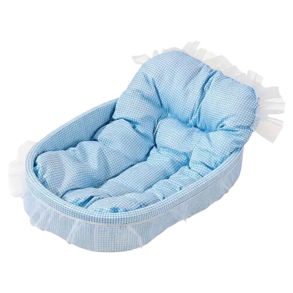 Light blue gingham fabric pet bed with white ruffled trim designed as a princess style cushion for small dogs