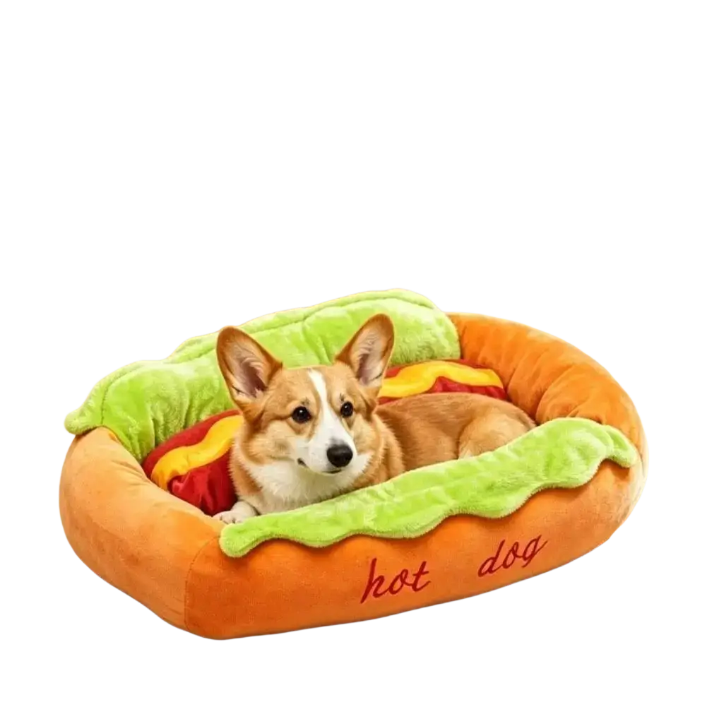 Orange plush hot dog-shaped pet bed for small dogs with green lettuce and red tomato accents and embroidered hot dog text