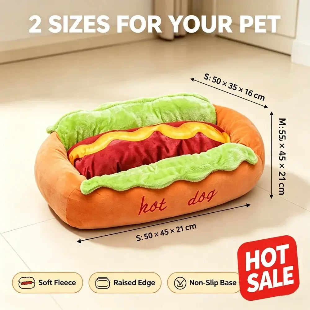 Orange plush hot dog pet bed with embroidered hot dog text and lettuce details perfect resting place for small dogs