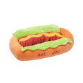 Orange plush hot dog shaped pet bed with green lettuce and yellow mustard details for small dogs resting place